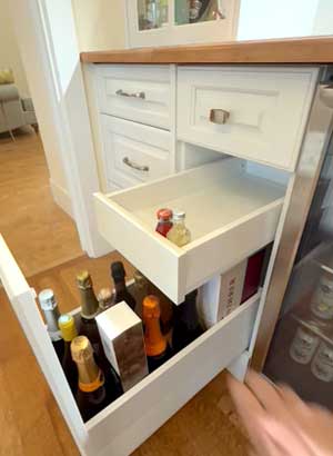 Replacing drawers with modern soft-close undermount slides for smooth operation.